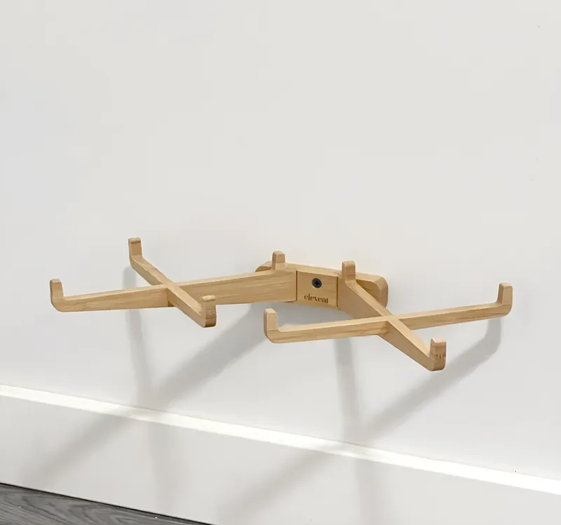 A dog eating from an elevated bowl